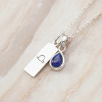 Sterling silver Libra Zodiac necklace with a September birthstone natural sapphire gemstone pendant