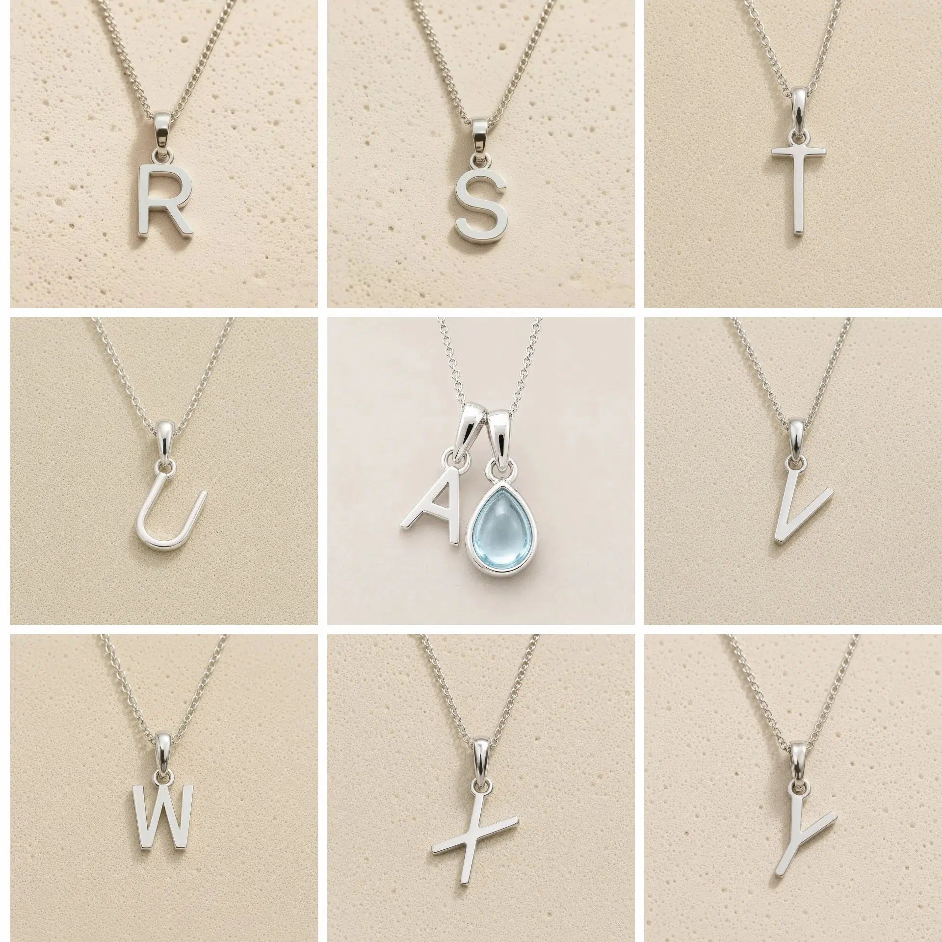 Collection of silver necklaces with letter pendants R to Y on a beige background, as personalised initial options for a March Birthstone Aquamarine Necklace.