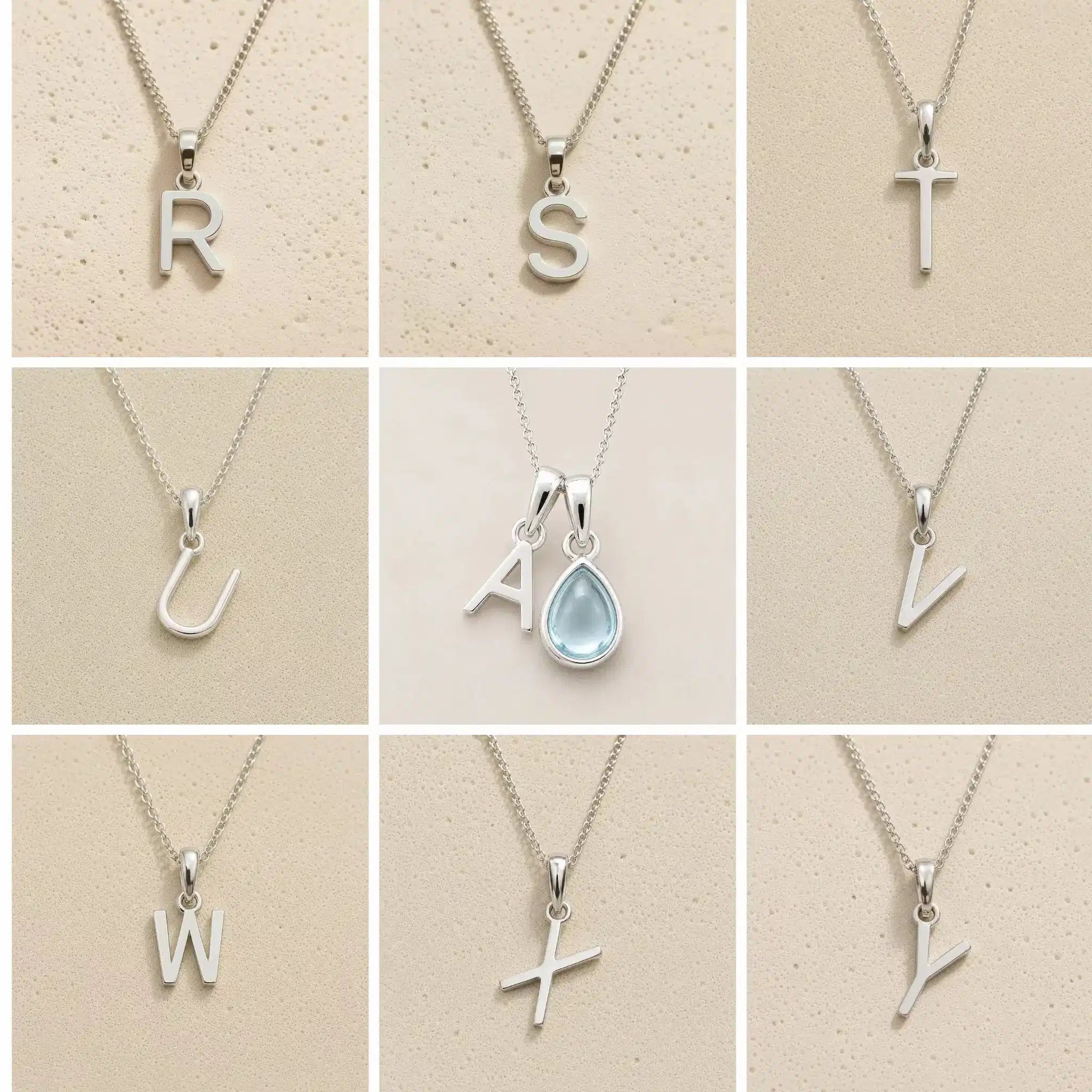 Collection of silver necklaces with letter pendants R to Y on a beige background, as personalised initial options for a March Birthstone Aquamarine Necklace.