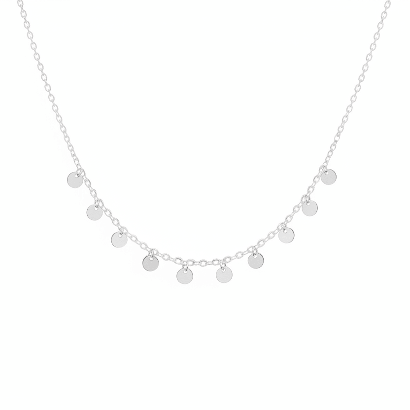 Sterling silver necklace with dainty silver discs dangling from it 