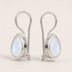 sterling silver moonstone earrings featuring faceted bezel-set pear-shaped natural moonstones