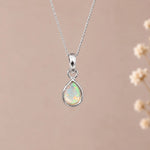 Silver October birthstone necklace with a teardrop natural opal pendant