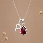 Sterling silver initial P necklace with a natural January garnet