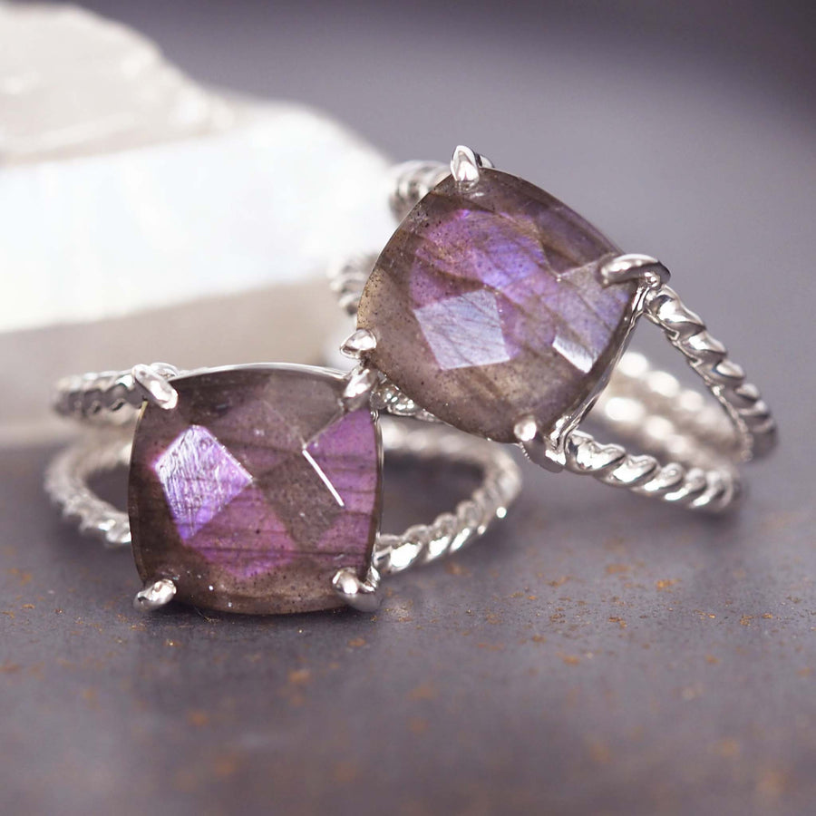 silver purple labradorite double twist ring - natural purple labradorite in a sterling silver claw setting with twist details - boho jewellery online by indie and harper