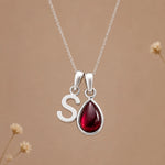 Sterling silver initial S necklace with a natural January garnet