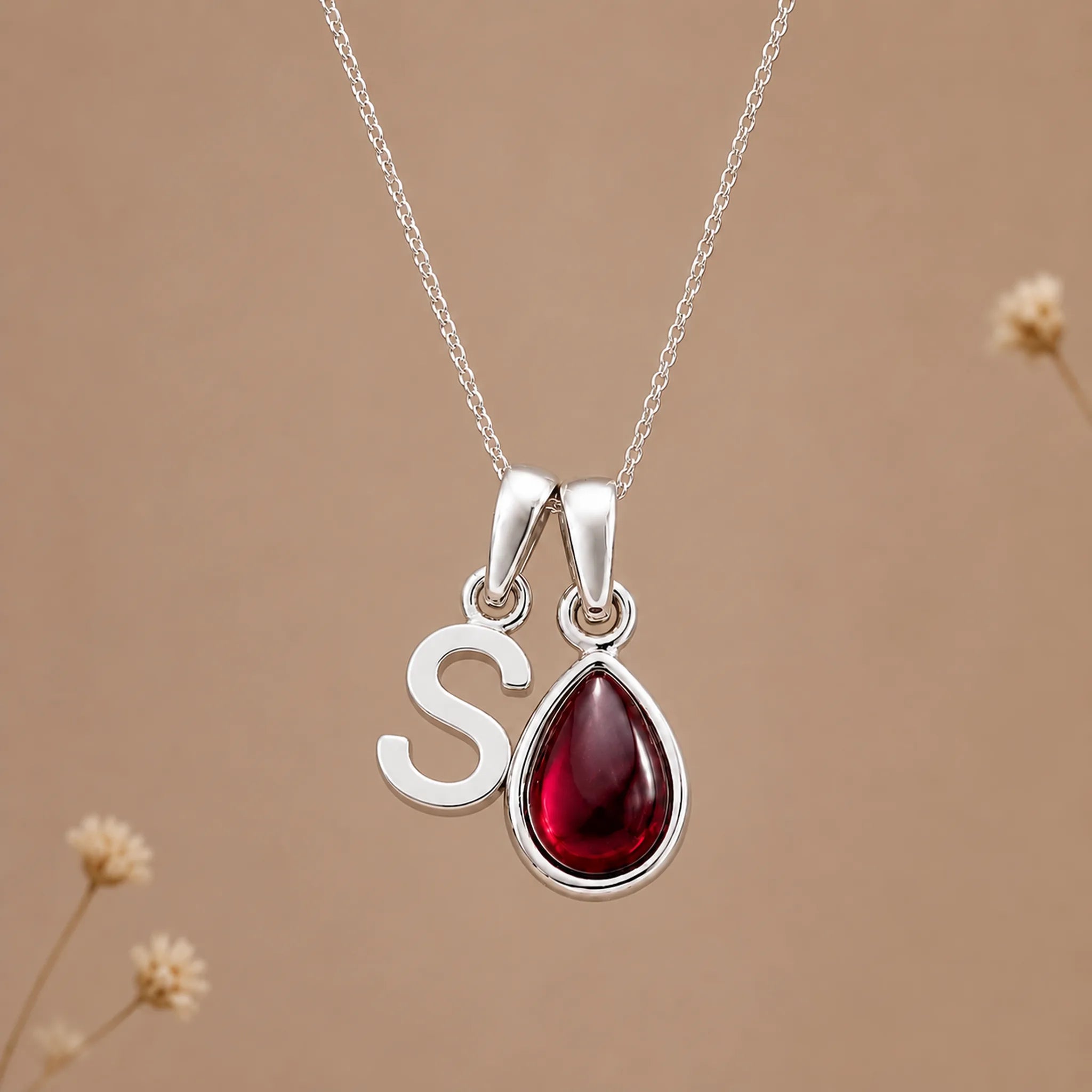 Sterling silver initial S necklace with a natural January garnet