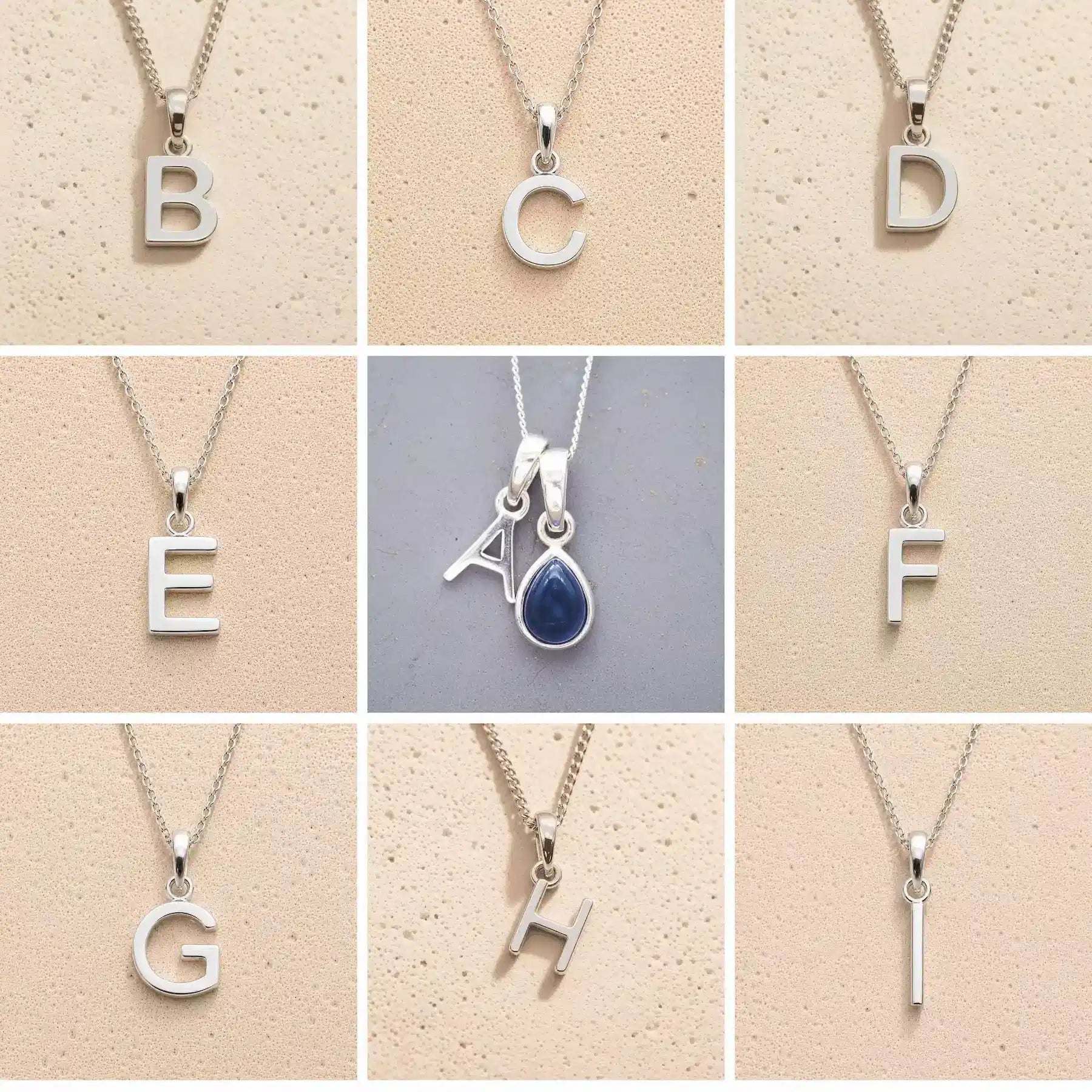 Collection of silver letter pendants A to I on beige backgrounds as initial options for September Birthstone Sapphire Necklace.