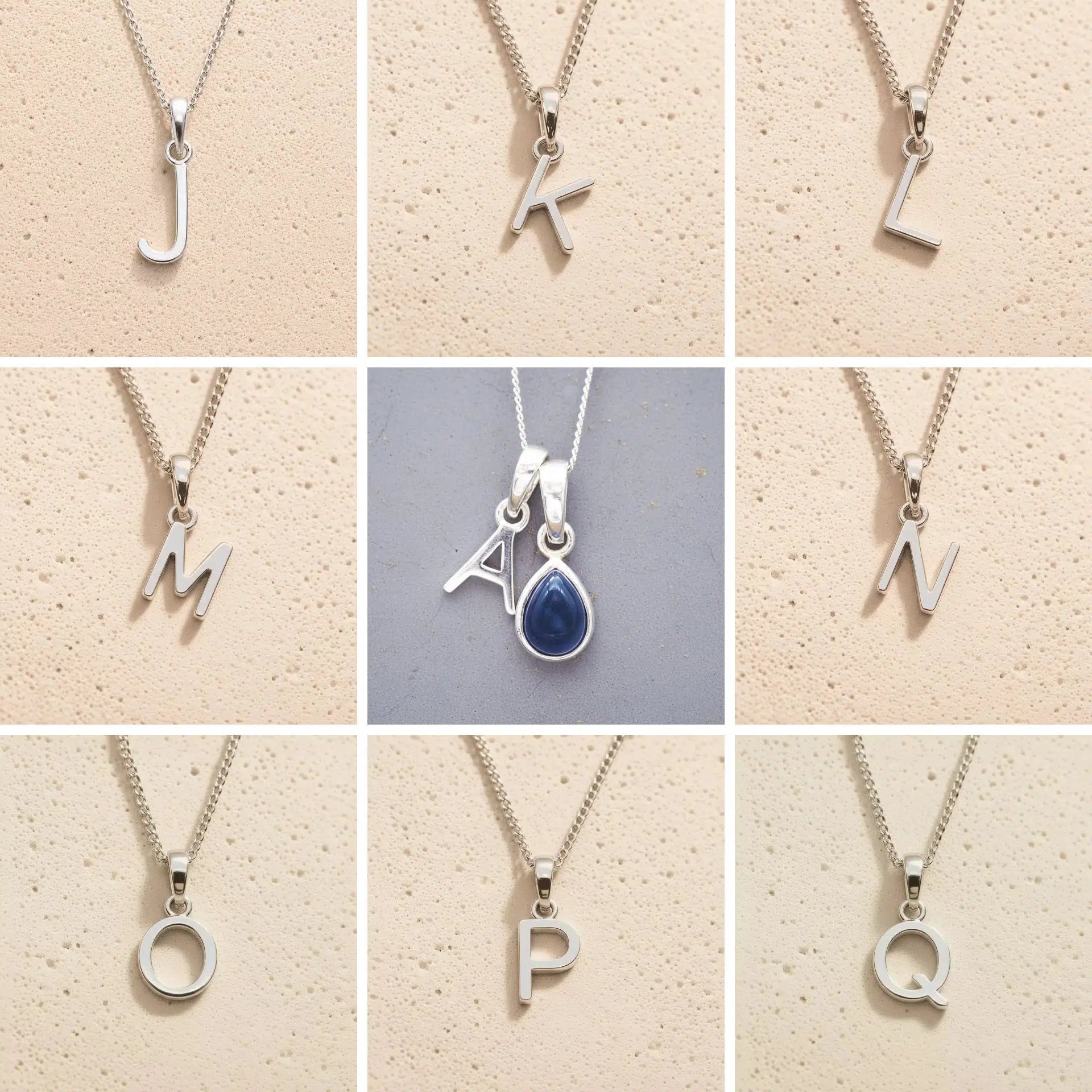 Collection of silver letter pendants J to  on beige backgrounds as initial options for September Birthstone Sapphire Necklace.