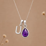 Sterling silver initial U necklace with a February amethyst pendant