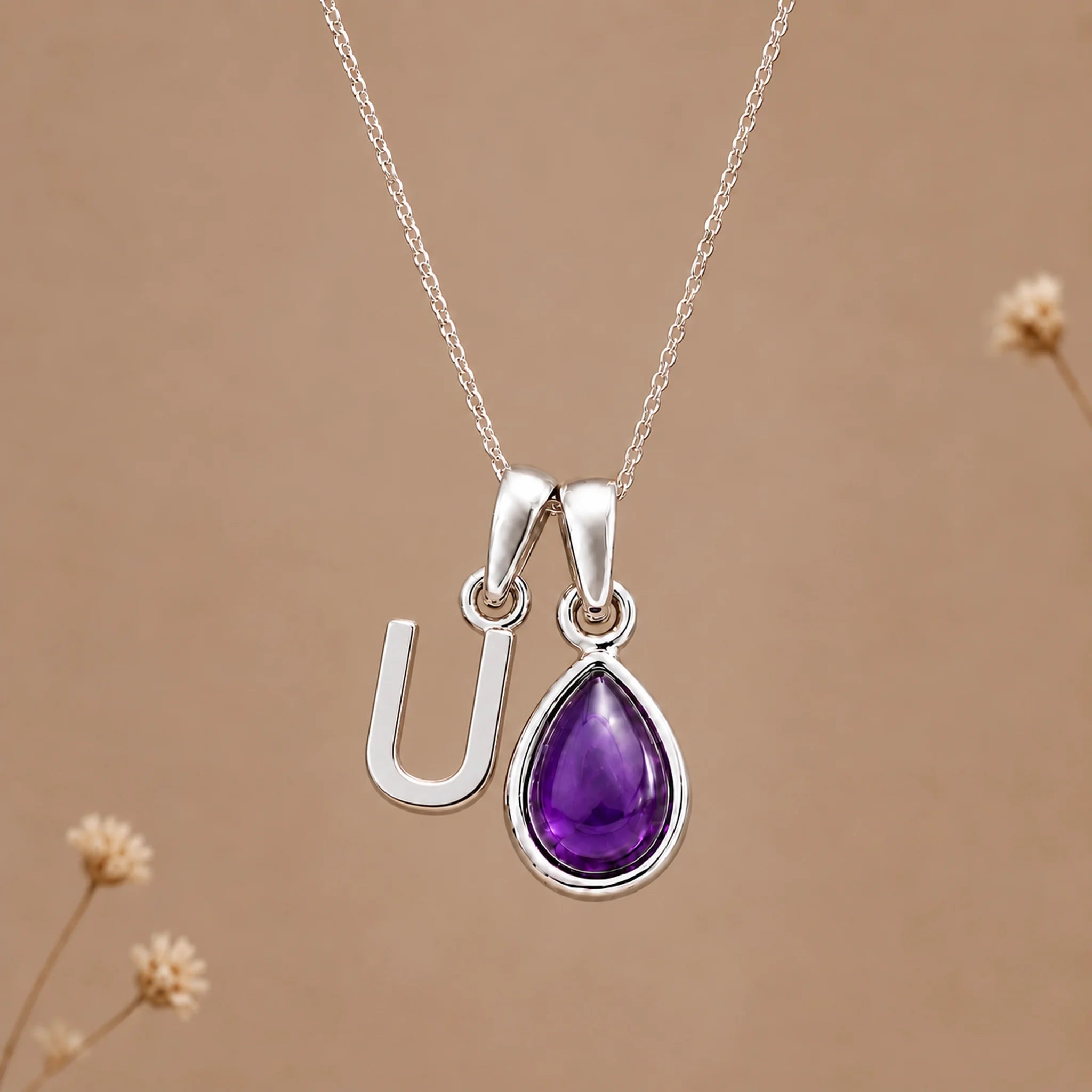 Sterling silver initial U necklace with a February amethyst pendant