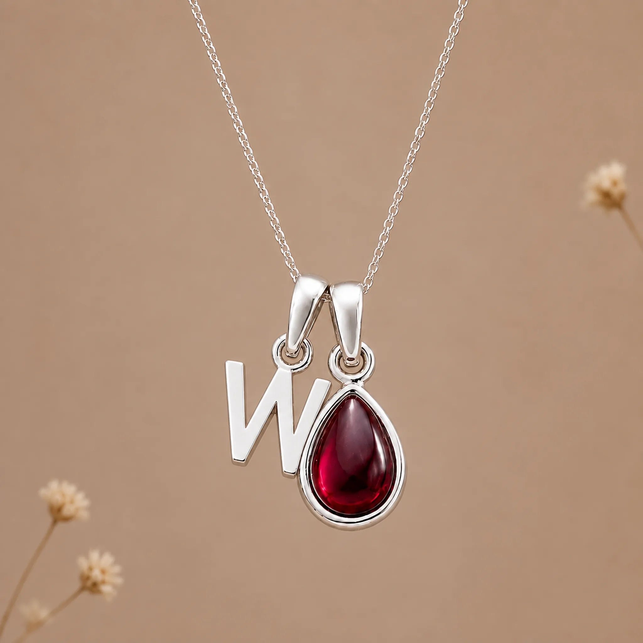 Sterling silver initial W necklace with a natural January garnet