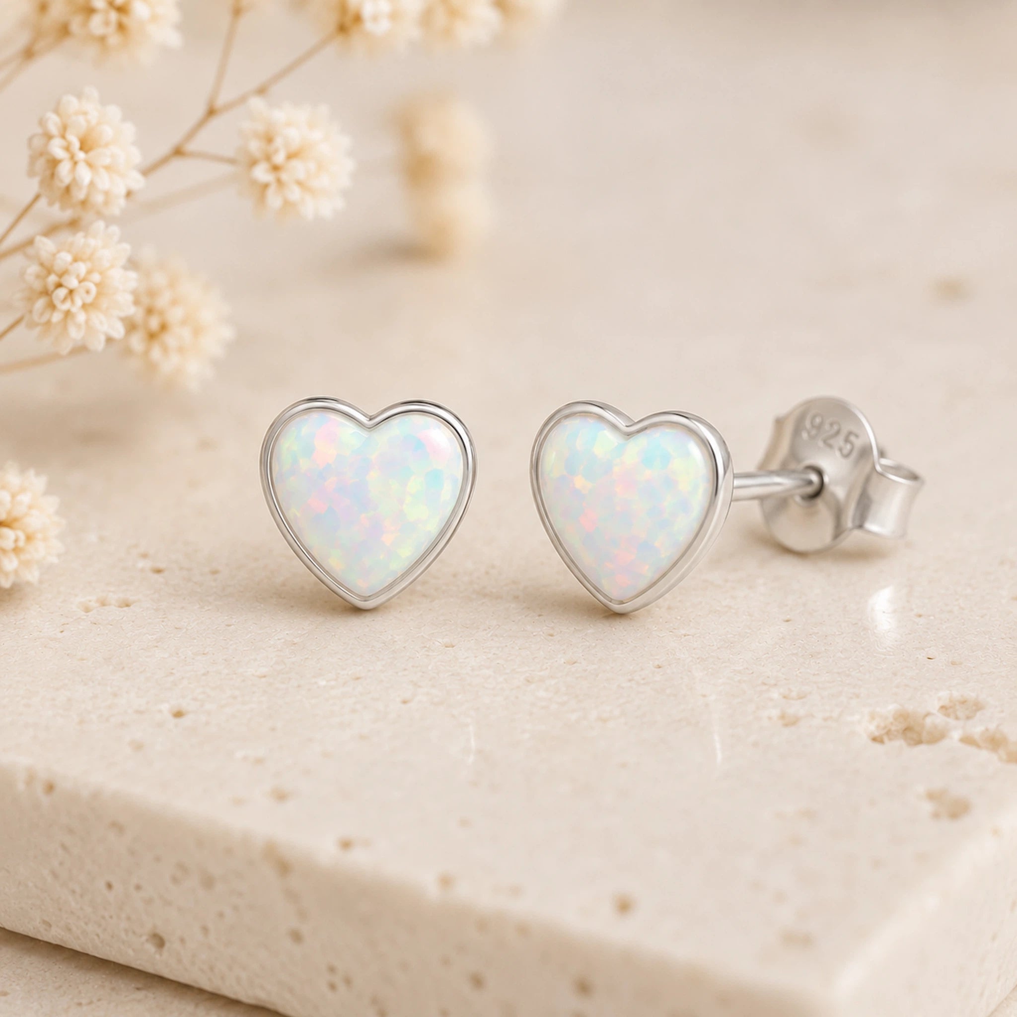 sterling silver stud earring with lab-grown white opal hearts
