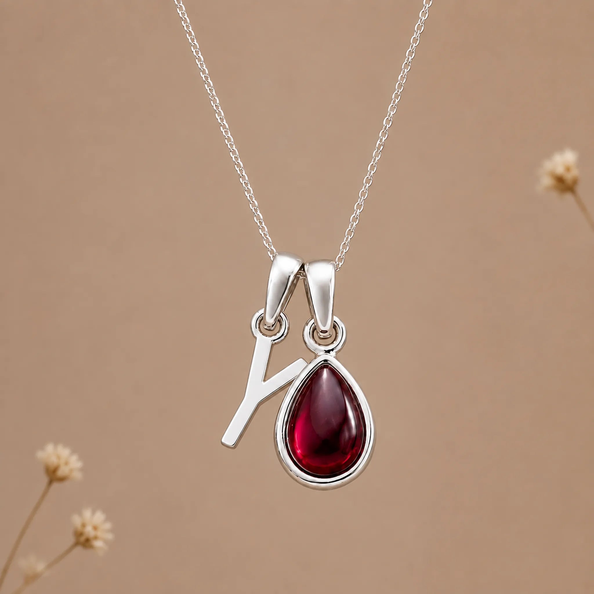 Sterling silver initial Y necklace with a natural January garnet