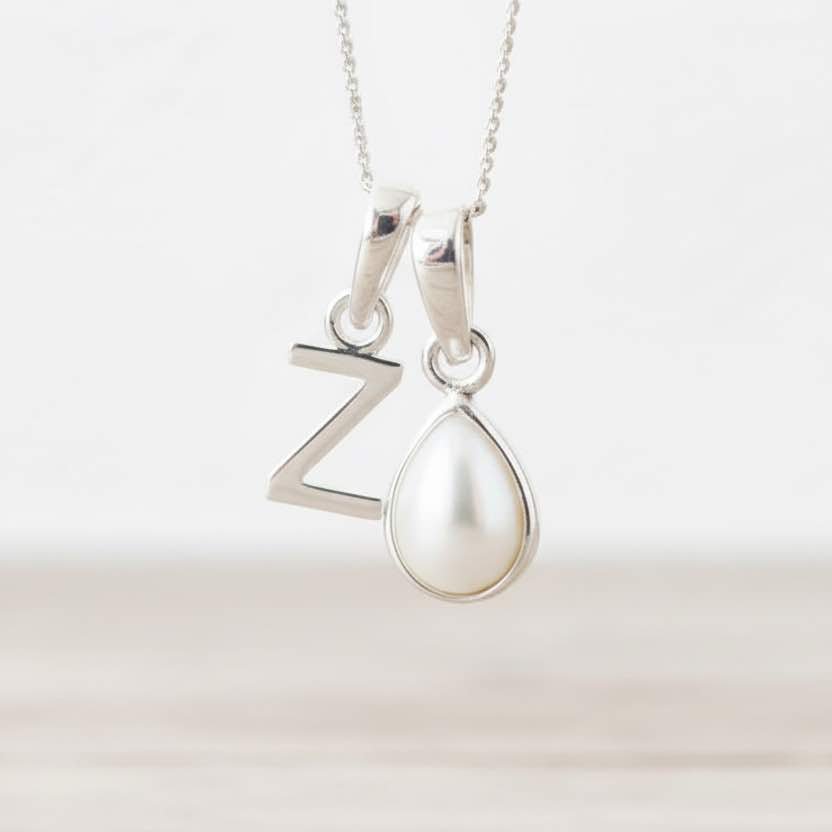 Silver necklace with a z initial and teardrop pearl pendant