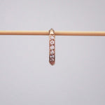 Single waterproof stainless steel pavé rose gold hoop huggie earring