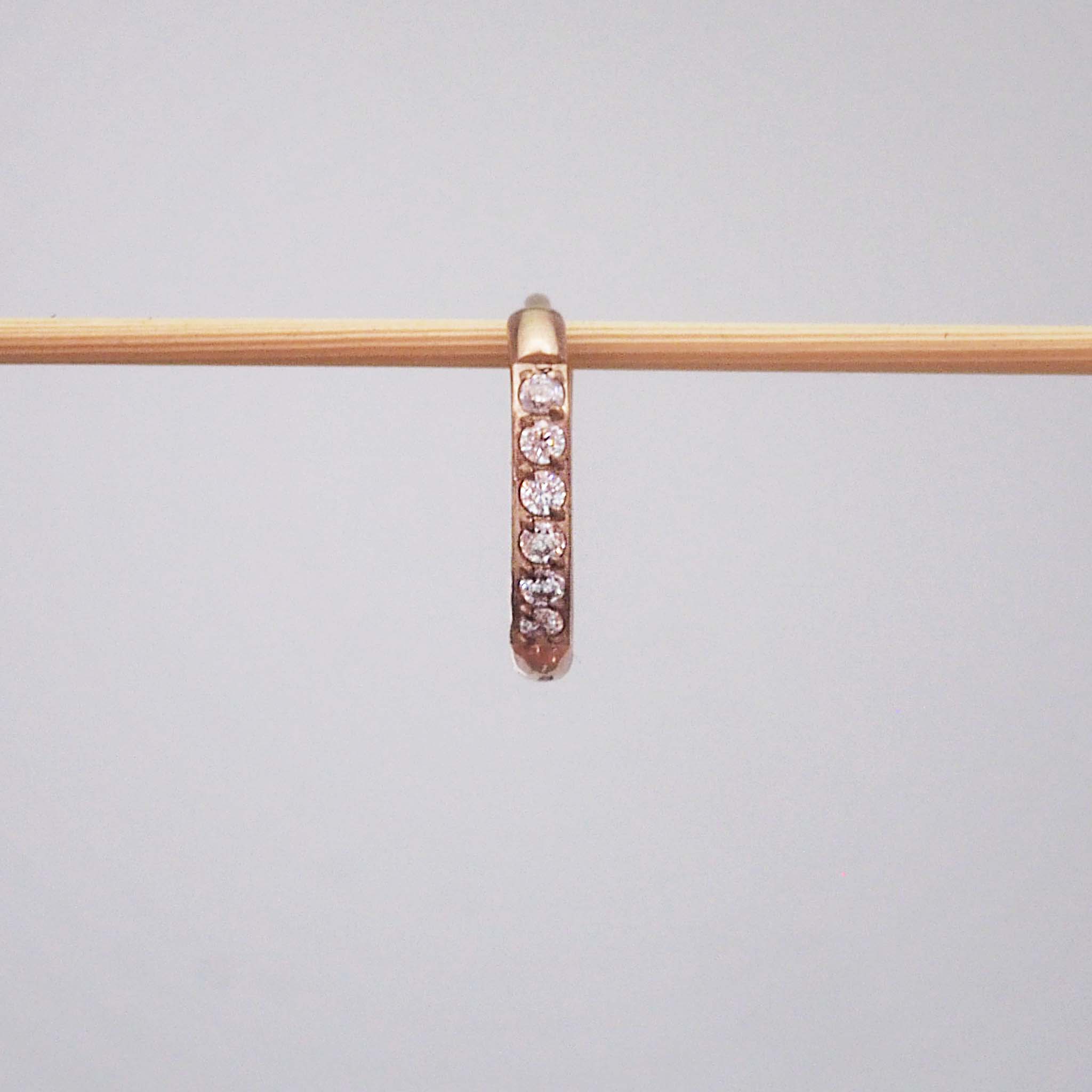 Single waterproof stainless steel pavé rose gold hoop huggie earring