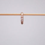 Single waterproof stainless steel pavé rose gold huggie earring
