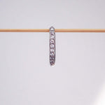 Single waterproof stainless steel pavé silver hoop earring