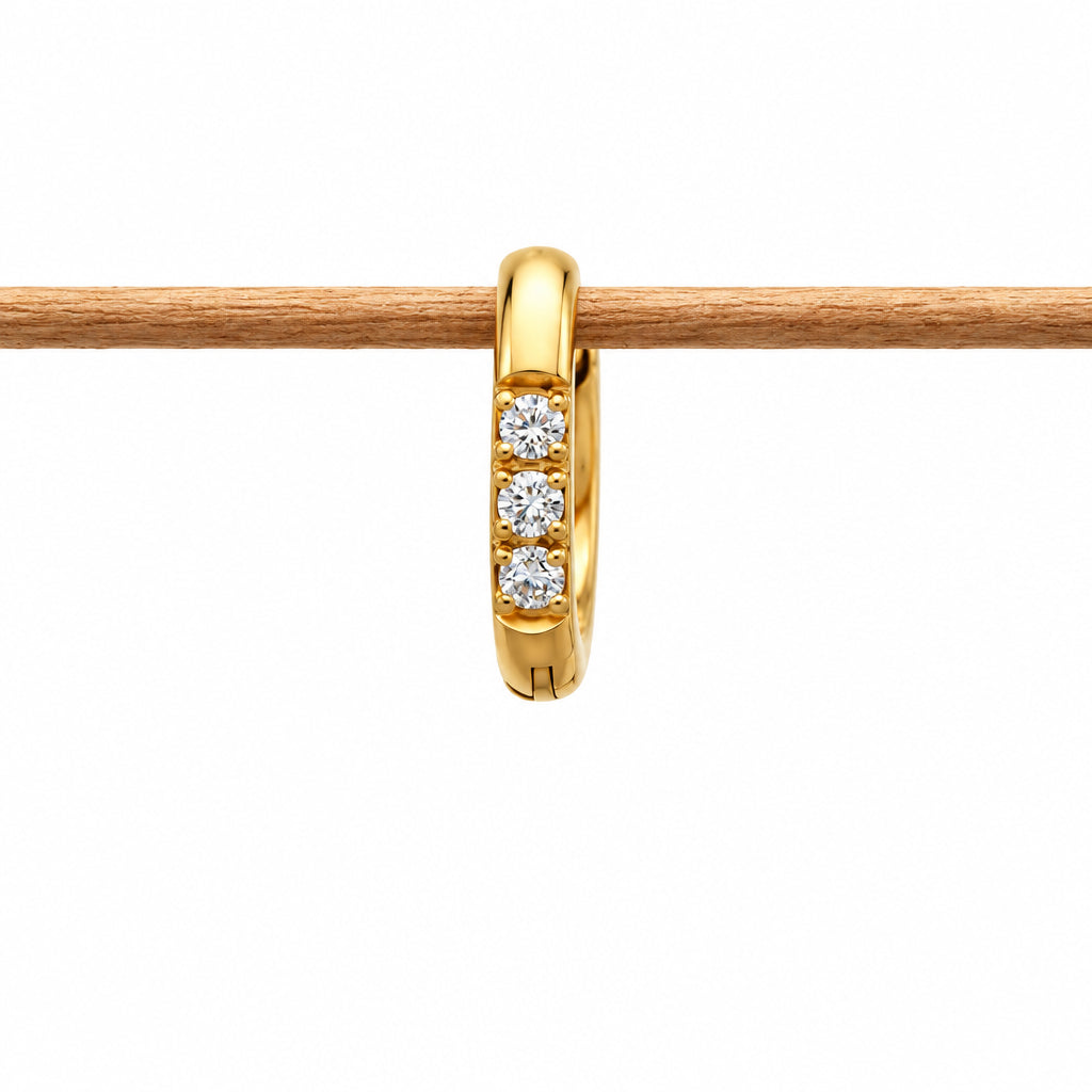 Single gold waterproof pavé huggie earring