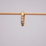 Single waterproof stainless steel pavé gold huggie earring