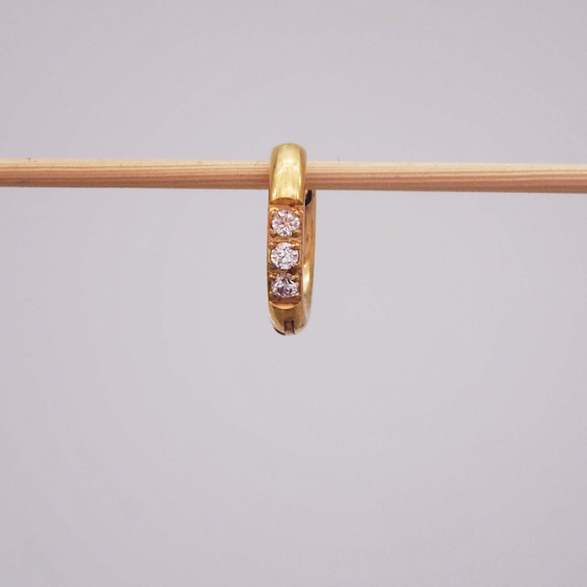 Single waterproof stainless steel pavé gold huggie earring