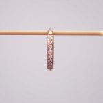 Single waterproof pavé rose gold hoop earring