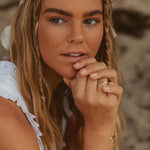 Woman wearing Solid 9k Gold Wave Ring designed by Australian jewellery brand Indie and Harper