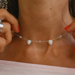 Indie and Harper dainty sterling silver stardust opal necklace being worn