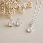 Sterling Silver April Birthstone Jewellery set featuring Clear Quartz Stud Earrings and matching Clear Quartz pendant necklace