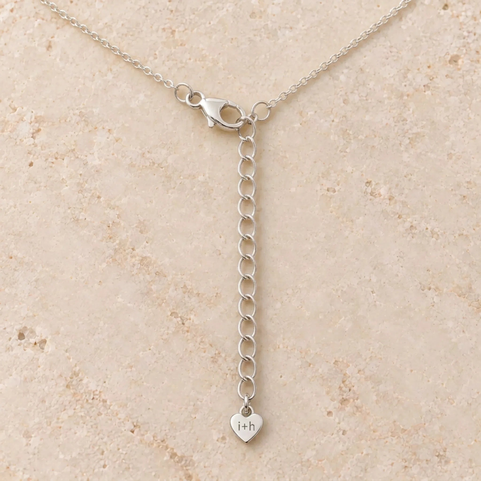 close up of clasp and extender for sterling silver fine cable chain necklace 