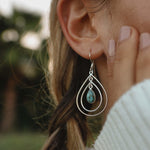 Woman wearing silver Turquoise Earrings by indie and harper jewellery