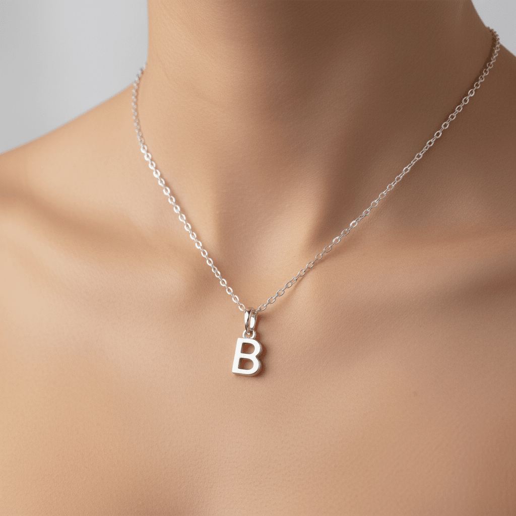 Sterling Silver necklace with a 'B' pendant being worn