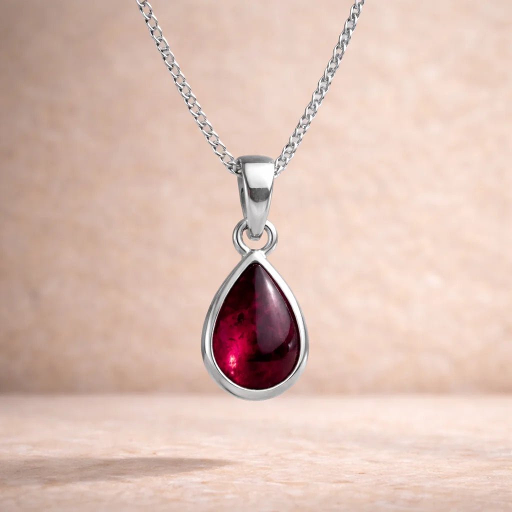 Sterling Silver January Birthstone Necklace with a teardrop-shaped natural garnet gemstone pendant - january birthday gift