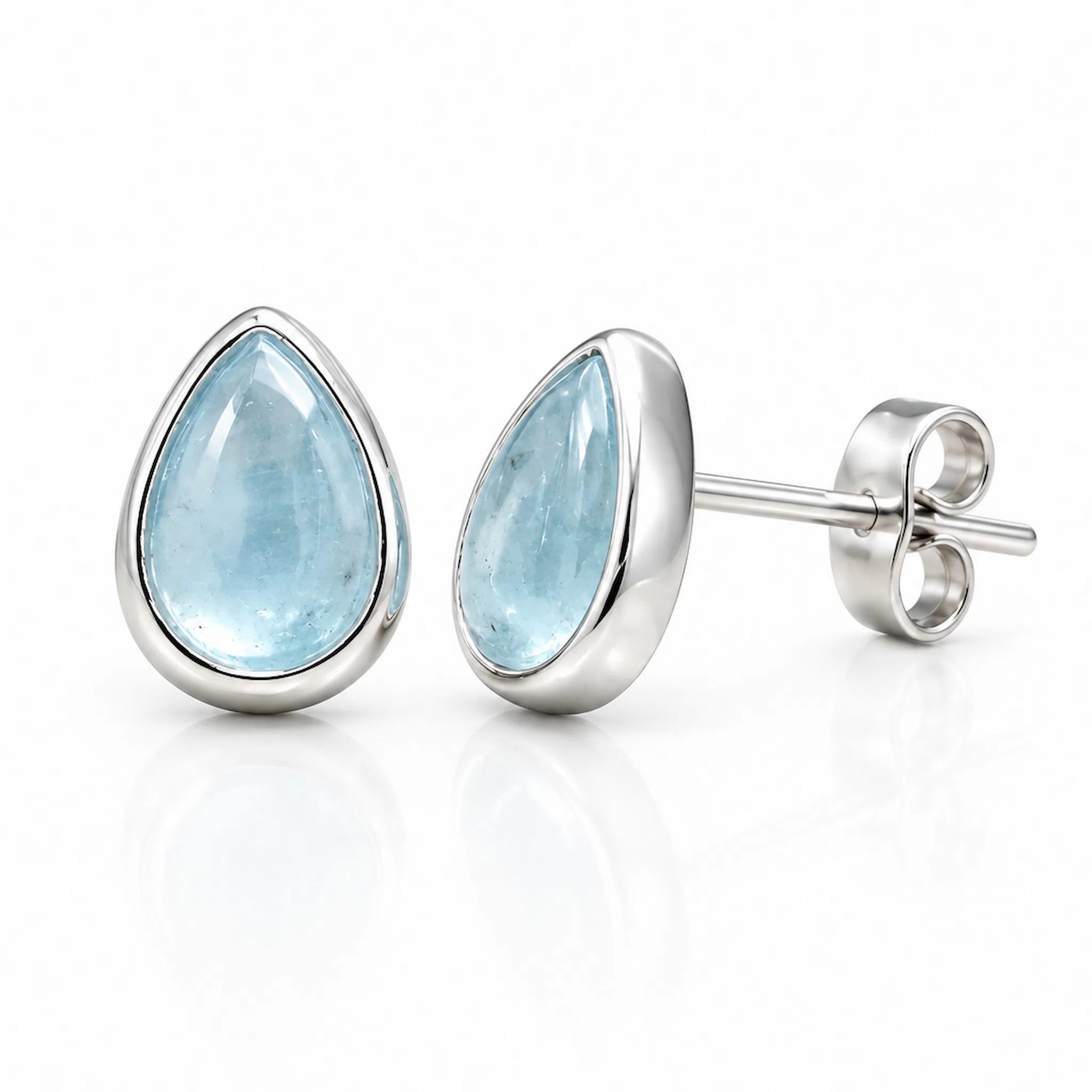 sterling silver Teardrop-shaped march birthstone natural aquamarine stud earrings on a white background