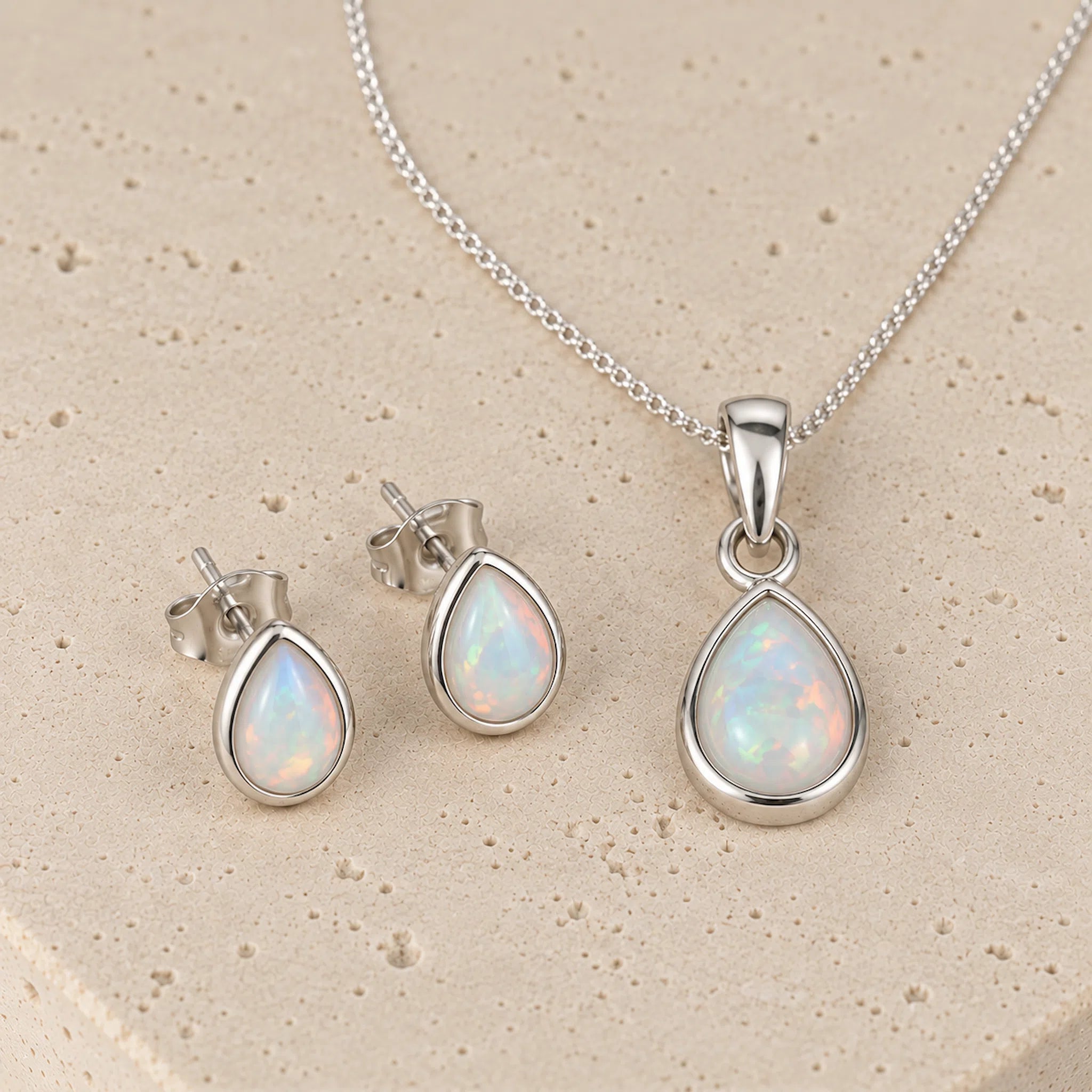 Sterling Silver October Birthstone opal Jewellery set including pear-shaped opal stud earrings and opal pendant necklace