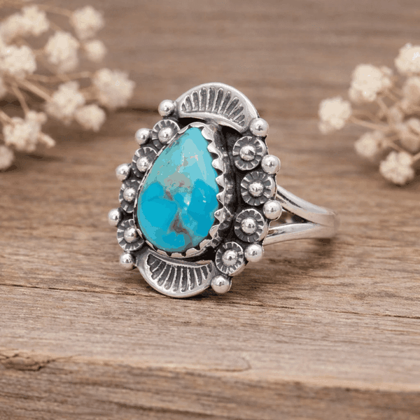 Sterling silver detailed ring with natural turquoise stone