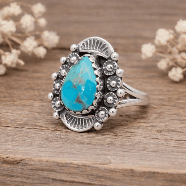 Sterling silver detailed ring with natural turquoise stone
