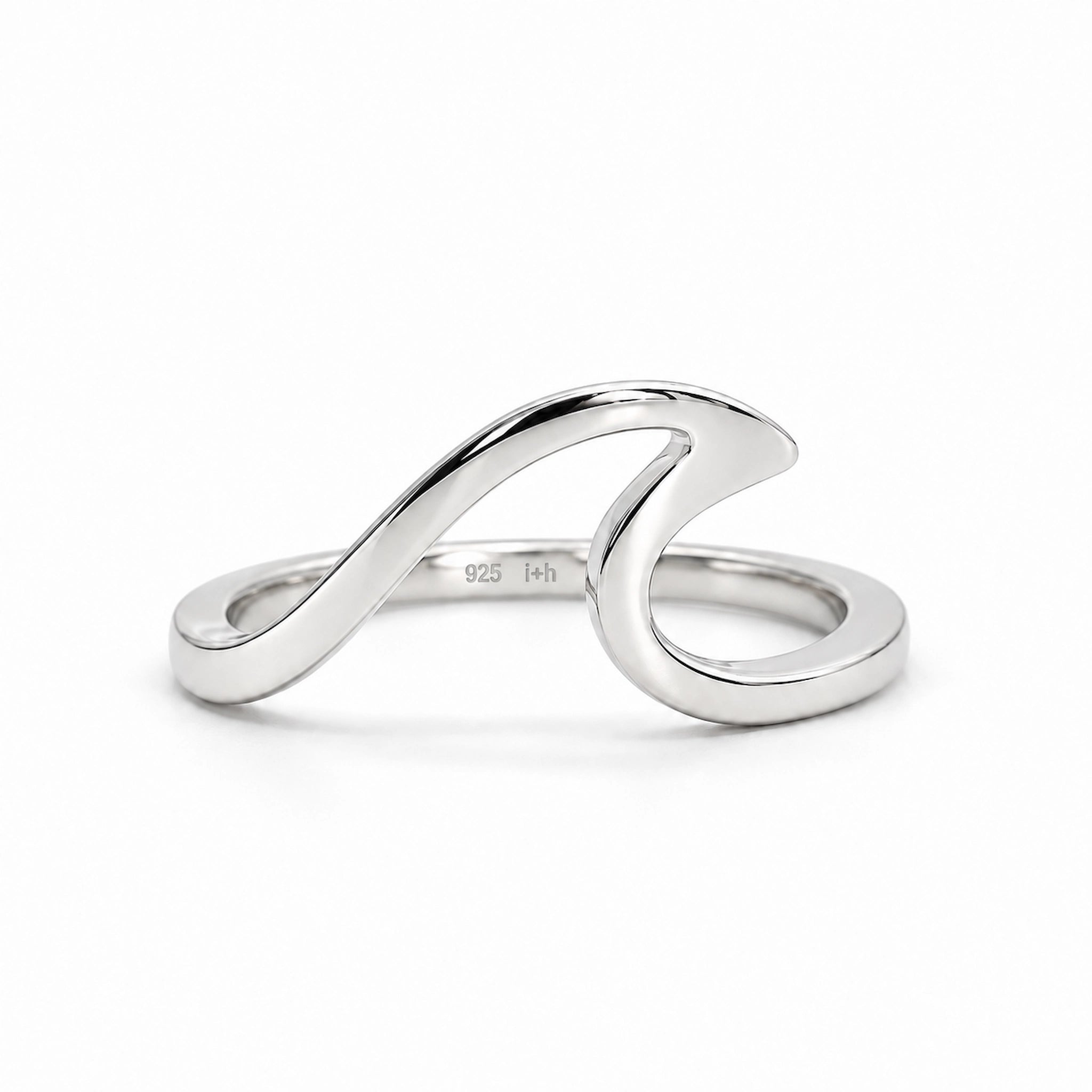sterling silver wave ring by indie and harper on a white background