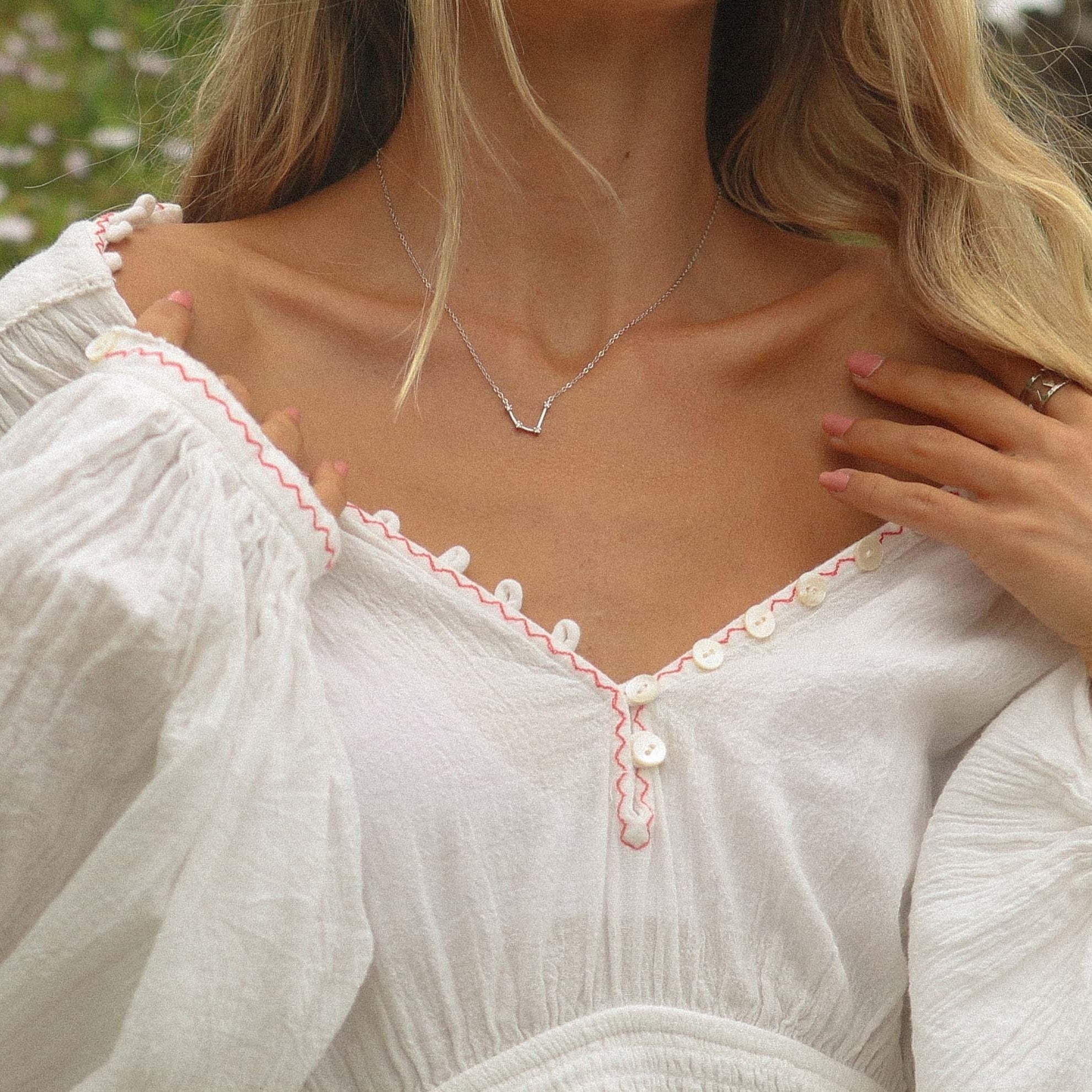 Woman wearing Constellation necklace by Australian jewellery brands online indie and harper