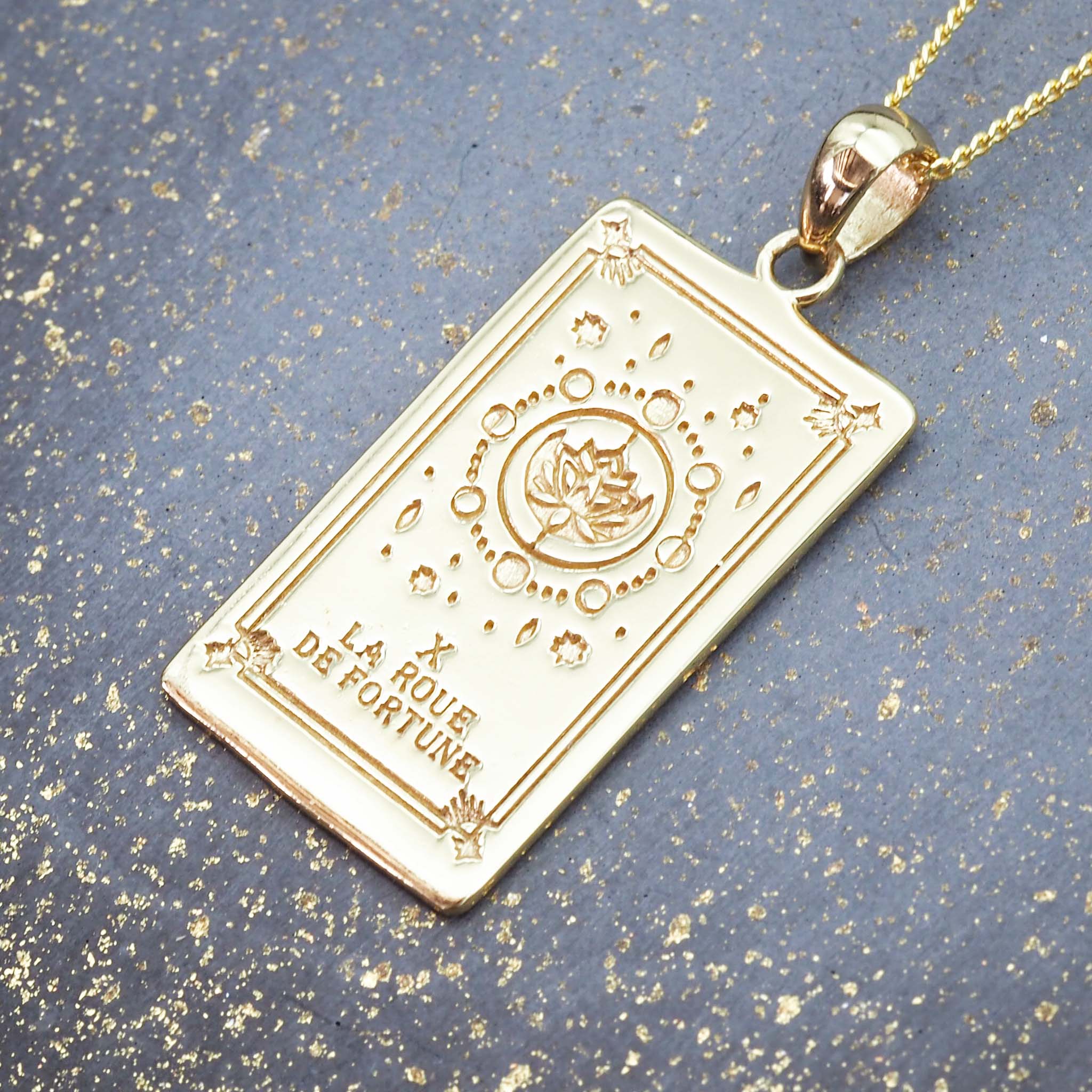 the wheel of fortune tarot card necklace in gold - tarot jewellery by boho jewelry brands indie and harper