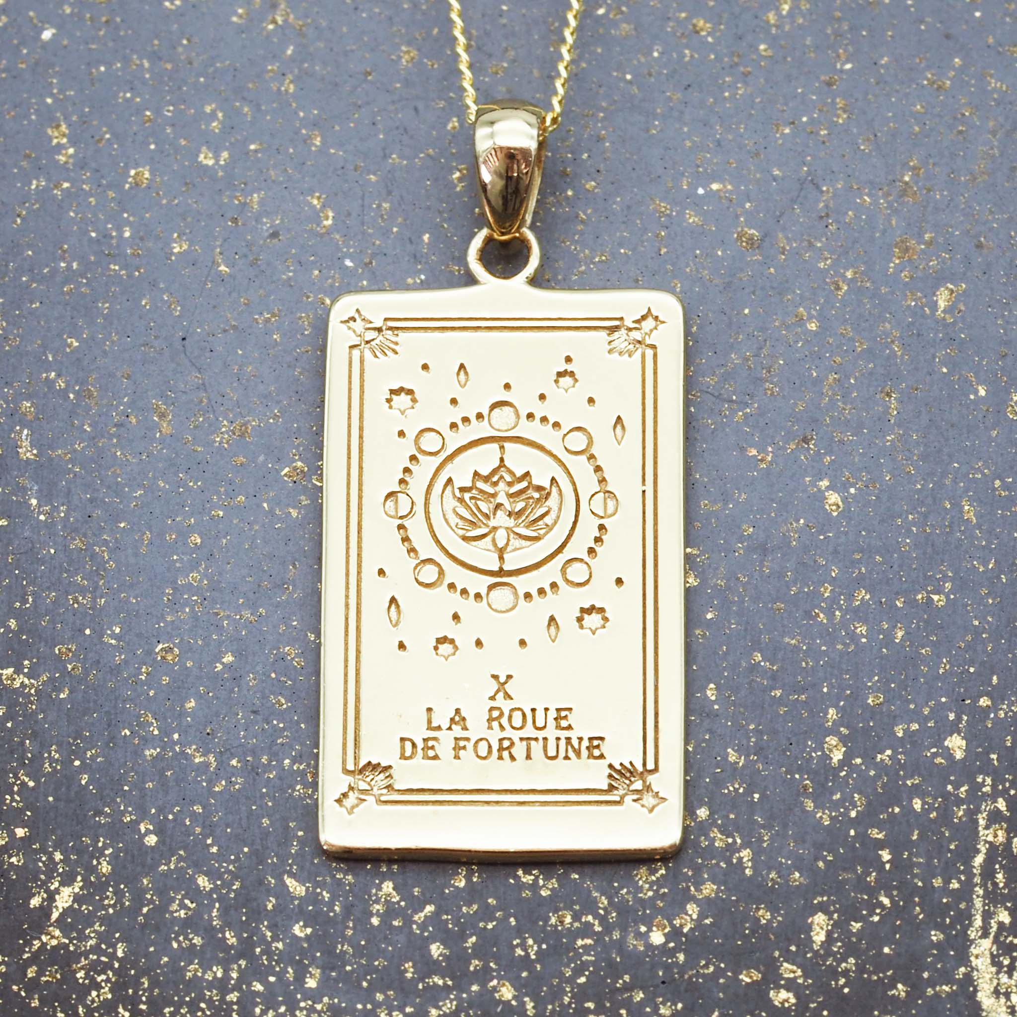 the wheel of fortune tarot card necklace in gold - tarot jewellery by boho jewelry brands indie and harper