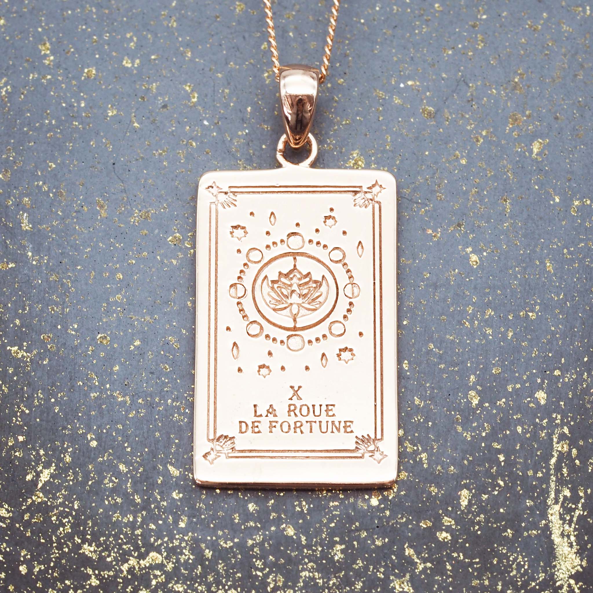 the wheel of fortune tarot card necklace in rose gold - tarot jewellery by boho jewelry brands indie and harper