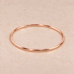 Thin 3mm rose gold bangle bracelet in PVD plated waterproof stainless steel