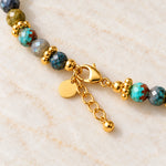 Close-up of turquoise and labradorite bracelet lobster clasp and extender chain