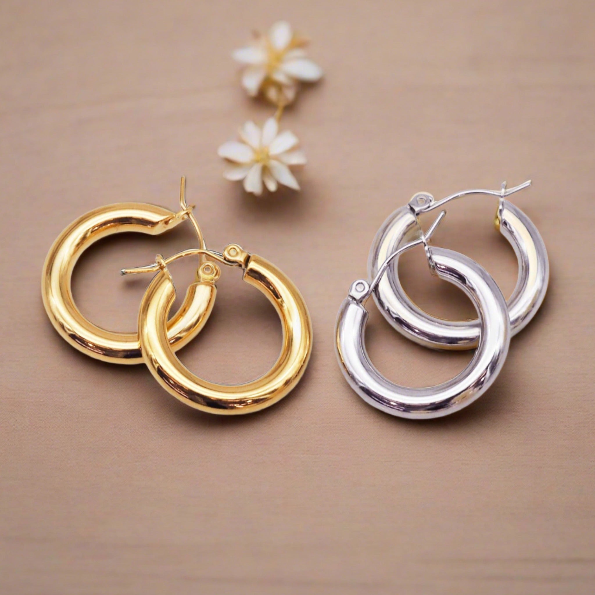 Indie and Harper gold hoop earrings and silver hoop earrings - waterproof jewellery