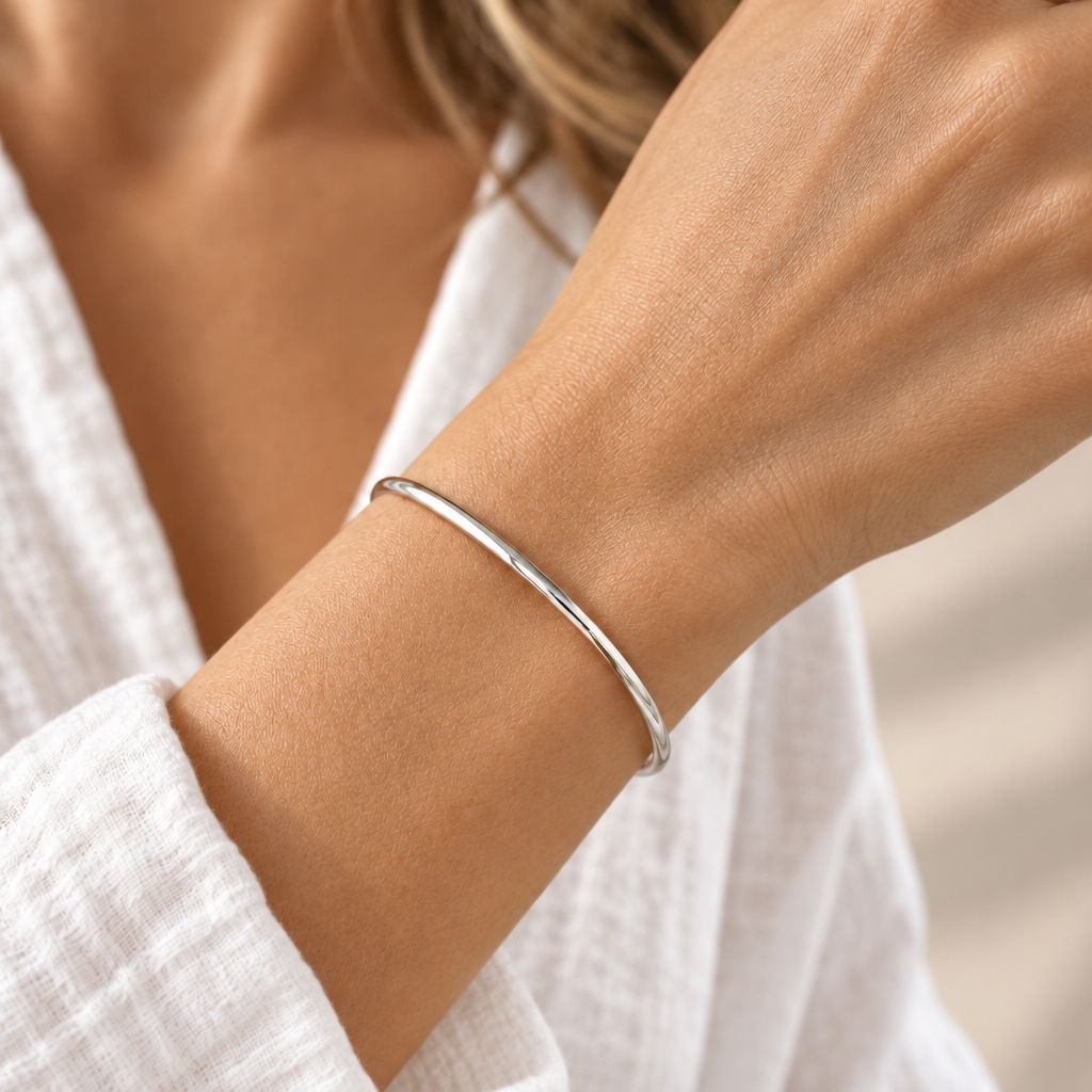 Waterproof silver 3mm bangle bracelet worn