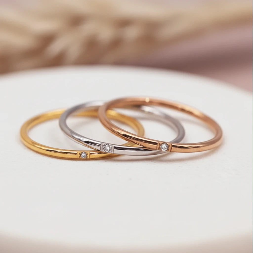 minimalist waterproof stacker rings in gold, silver and rose gold and cubic zirconias