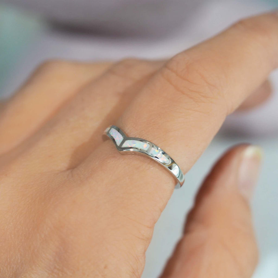 Woman’s hand wearing White Opal Ring - opal jewellery Australia
