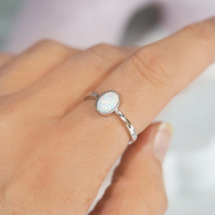 woman wearing white opal sterling silver ring - opal jewellery by indie and harper