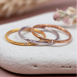 silver, gold and rose gold stacker rings by indie and harper australia